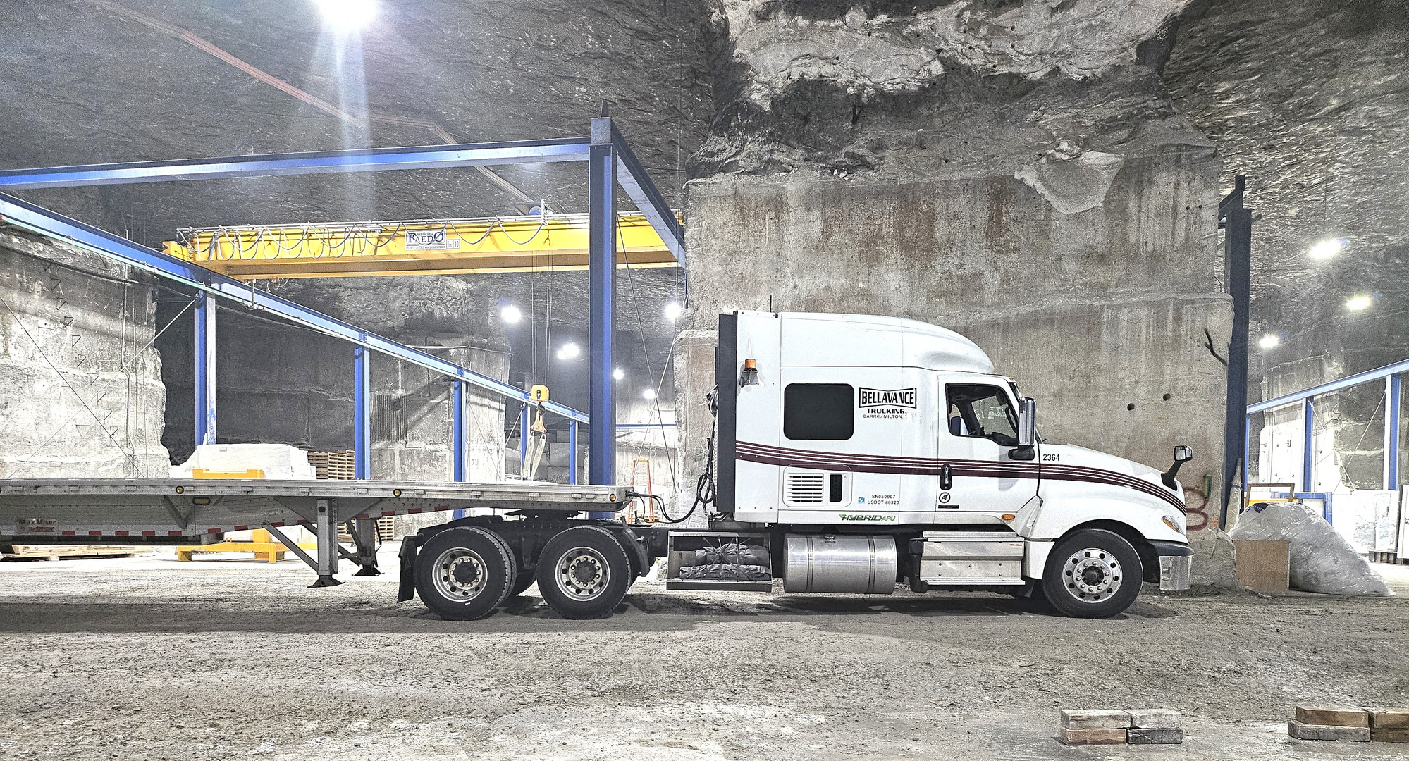 Heavy equipment on RGN trailer